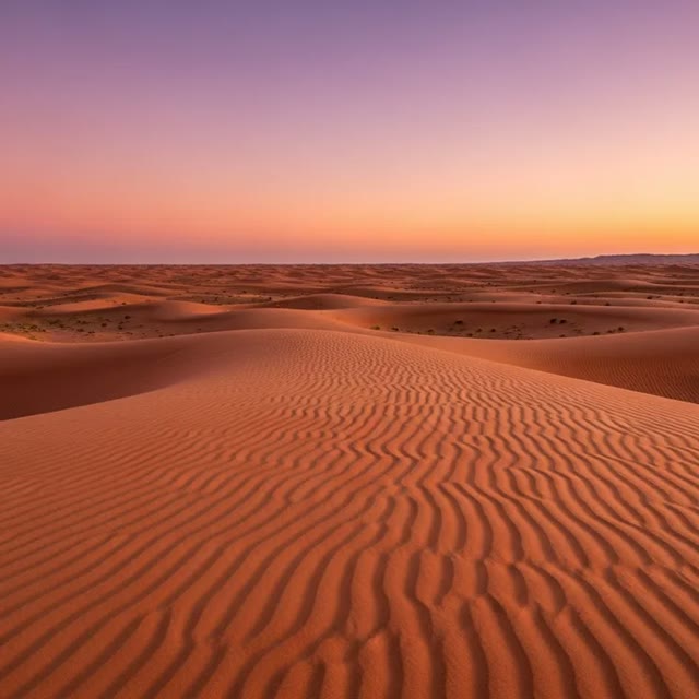 Sunrise over the red dunes on the Morning Desert Safari